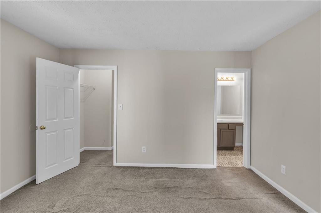 5910 Hampton Court Atlanta, GA 30349 - Photo 11 of 23 a view of an empty room and closet area