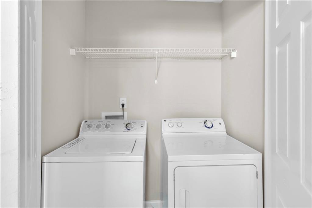 5910 Hampton Court Atlanta, GA 30349 - Photo 15 of 23 a utility room with dryer and washer