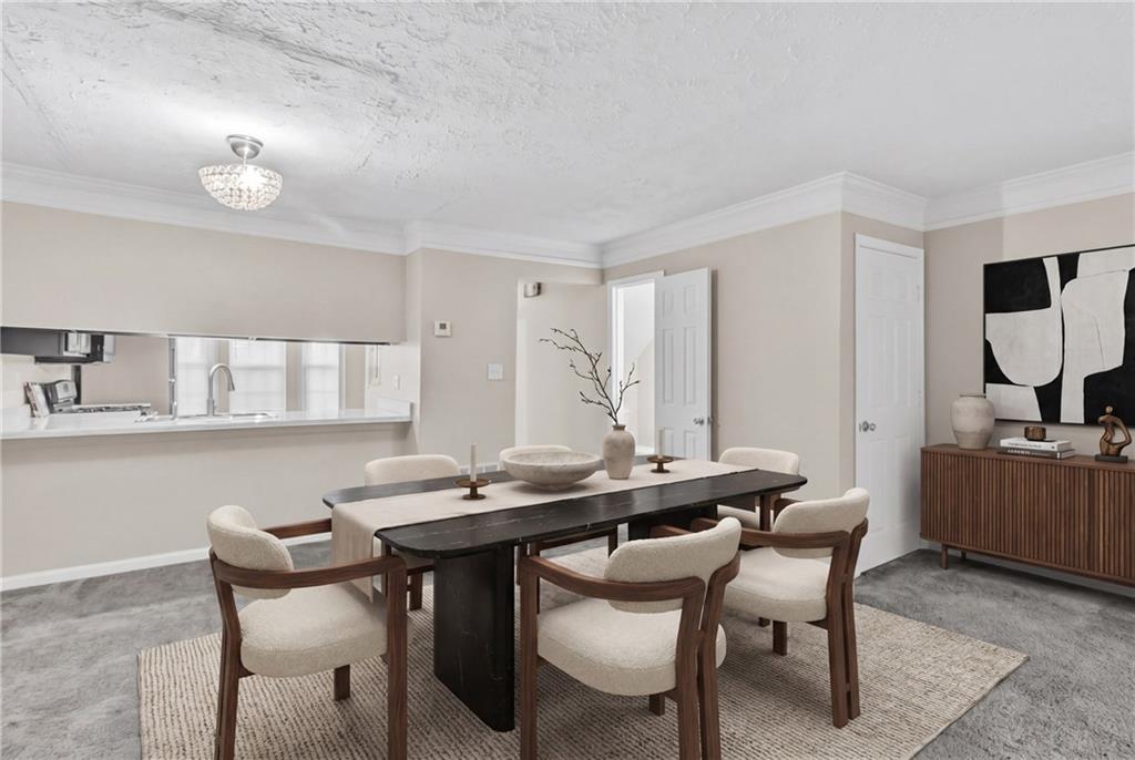 5910 Hampton Court Atlanta, GA 30349 - Photo 5 of 23 a view of a dining room with furniture and window