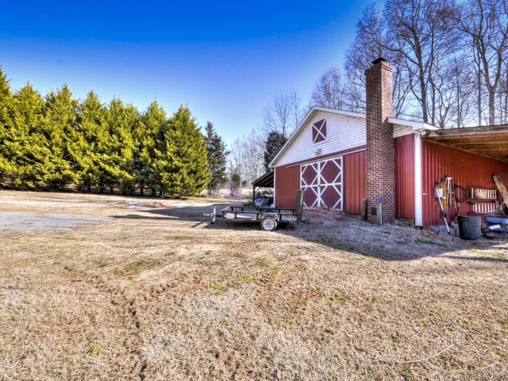1444 Crossland Road Clover, SC 29710 - Photo 22 of 24 a front view of a house with a yard and garage
