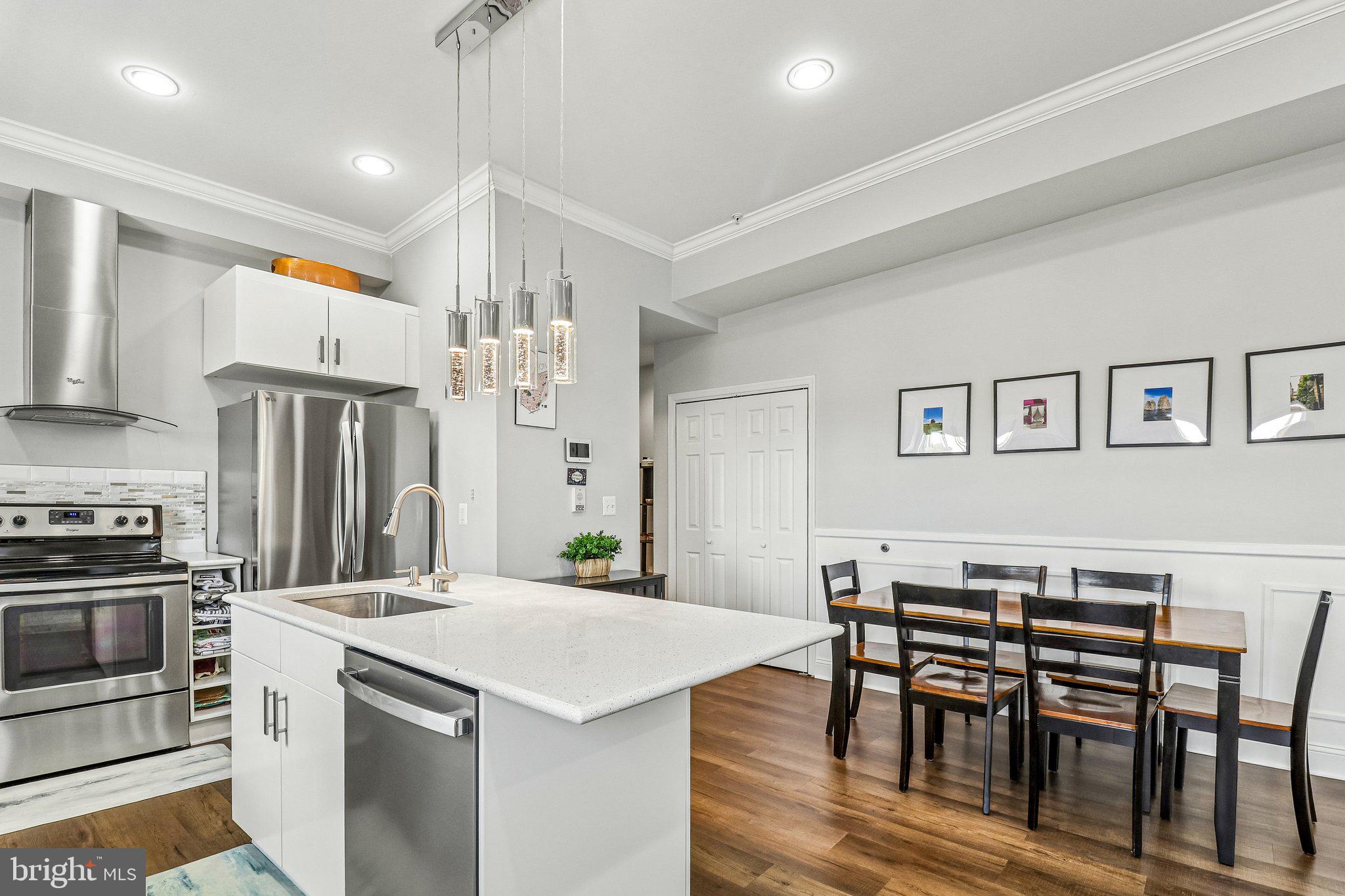 233 S Street Northeast, Unit 5 Washington, DC 20002 - Photo 11 of 41 Modern kitchen with elegant dining area.