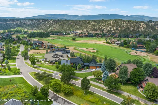 a view of a patio with couches chairs and a table and chairs