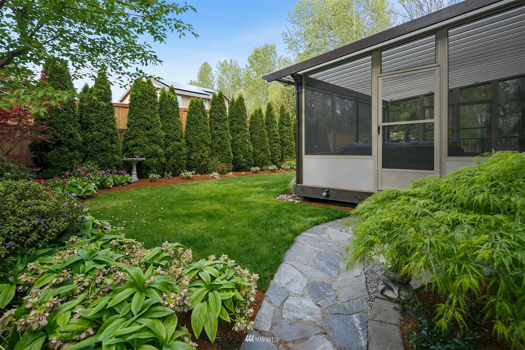 4124 Northeast 6th Place Renton, WA 98059 - Photo 30 of 38 a view of a back yard of the house