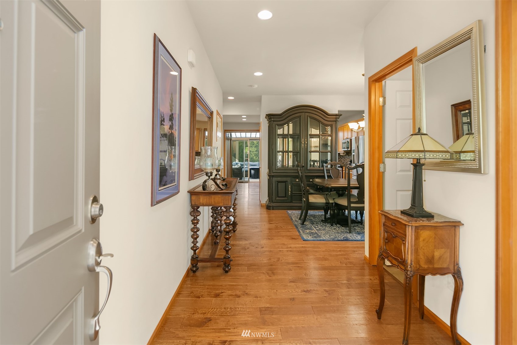 4124 Northeast 6th Place Renton, WA 98059 - Photo 3 of 38 a view of a hallway with living room and furniture