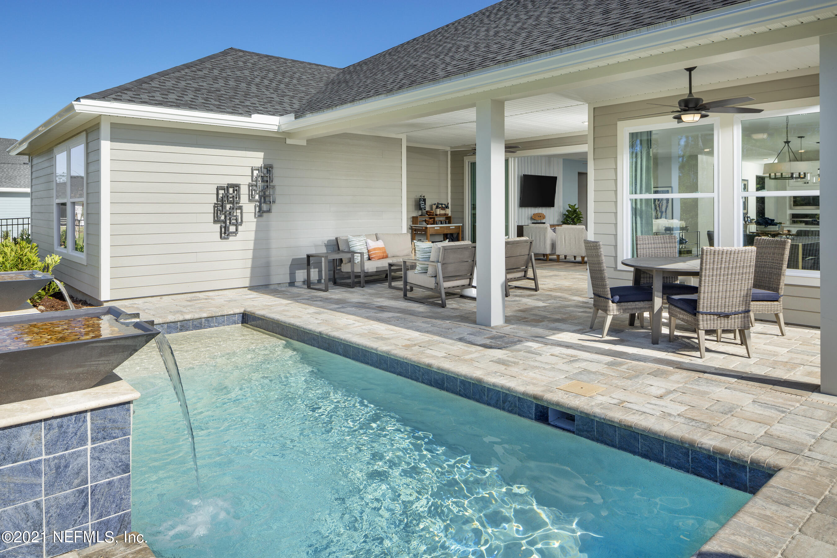 35 Windley Drive St. Augustine, FL 32092 - Photo 8 of 8 a swimming pool with outdoor seating and yard