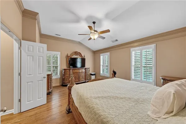 a bedroom with furniture and a couch