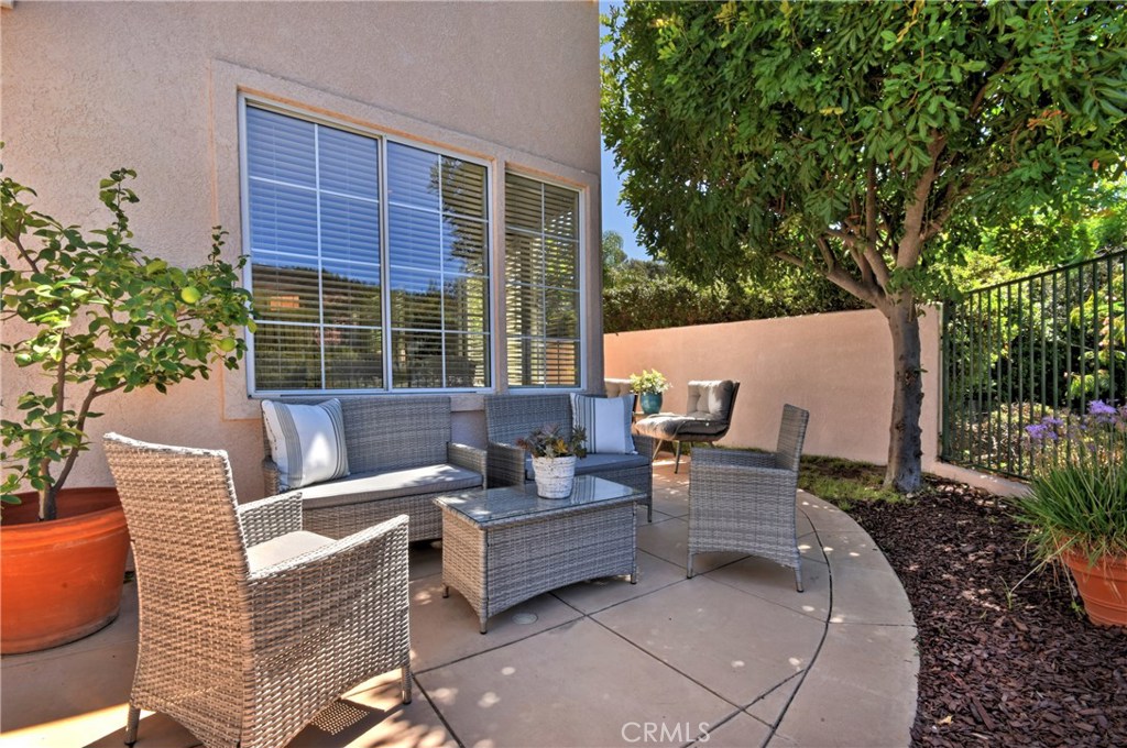 3619 Cll Joaquin Calabasas, CA 91302 - Photo 20 of 42 a view of a patio with couches chairs and a potted plant