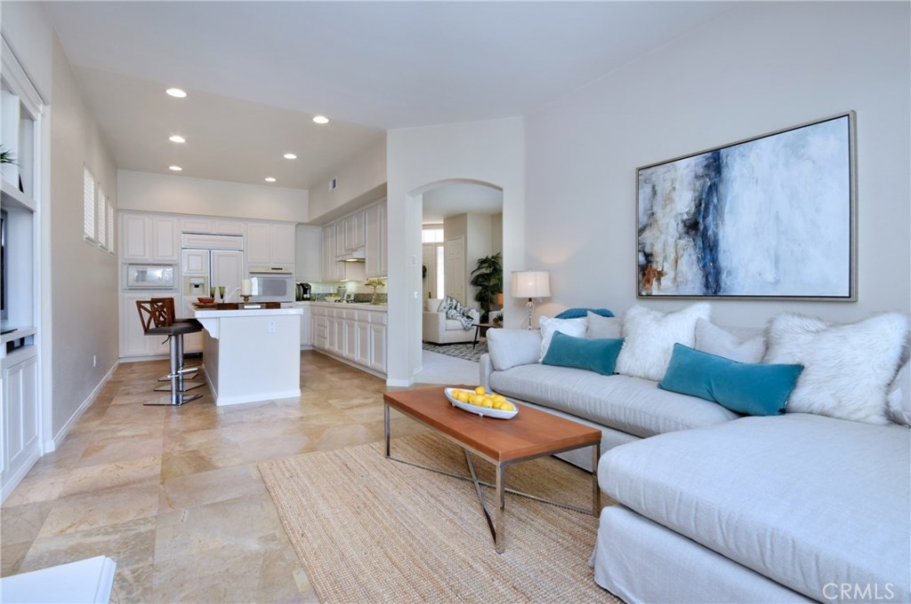 3619 Cll Joaquin Calabasas, CA 91302 - Photo 22 of 42 a living room with furniture and kitchen view