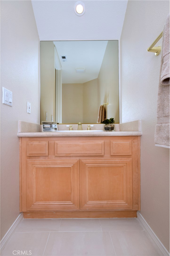 3619 Cll Joaquin Calabasas, CA 91302 - Photo 27 of 42 a bathroom with a sink and a mirror