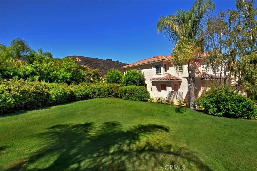 3619 Cll Joaquin Calabasas, CA 91302 - Photo 40 of 42 a front view of a house with a garden