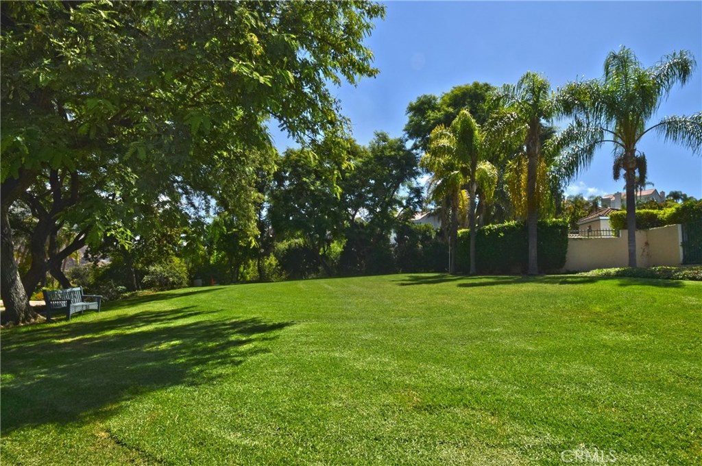 3619 Cll Joaquin Calabasas, CA 91302 - Photo 41 of 42 a view of a grassy field with trees
