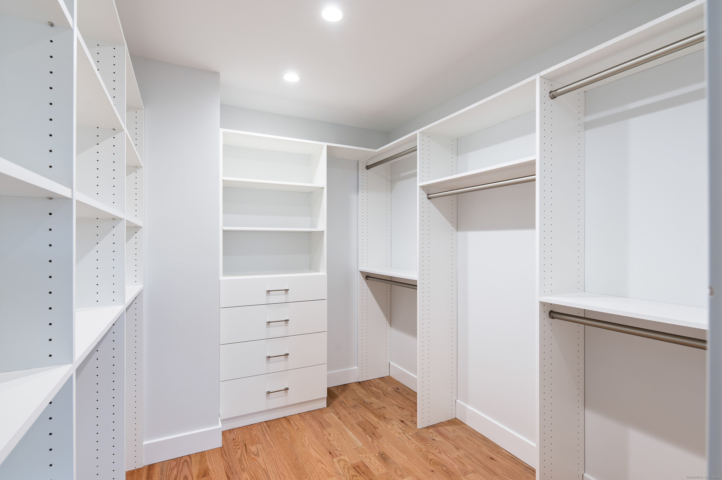 12 Walnut Ridge Court Stamford, CT 06905 - Photo 16 of 32 a view of walk in closet with empty racks