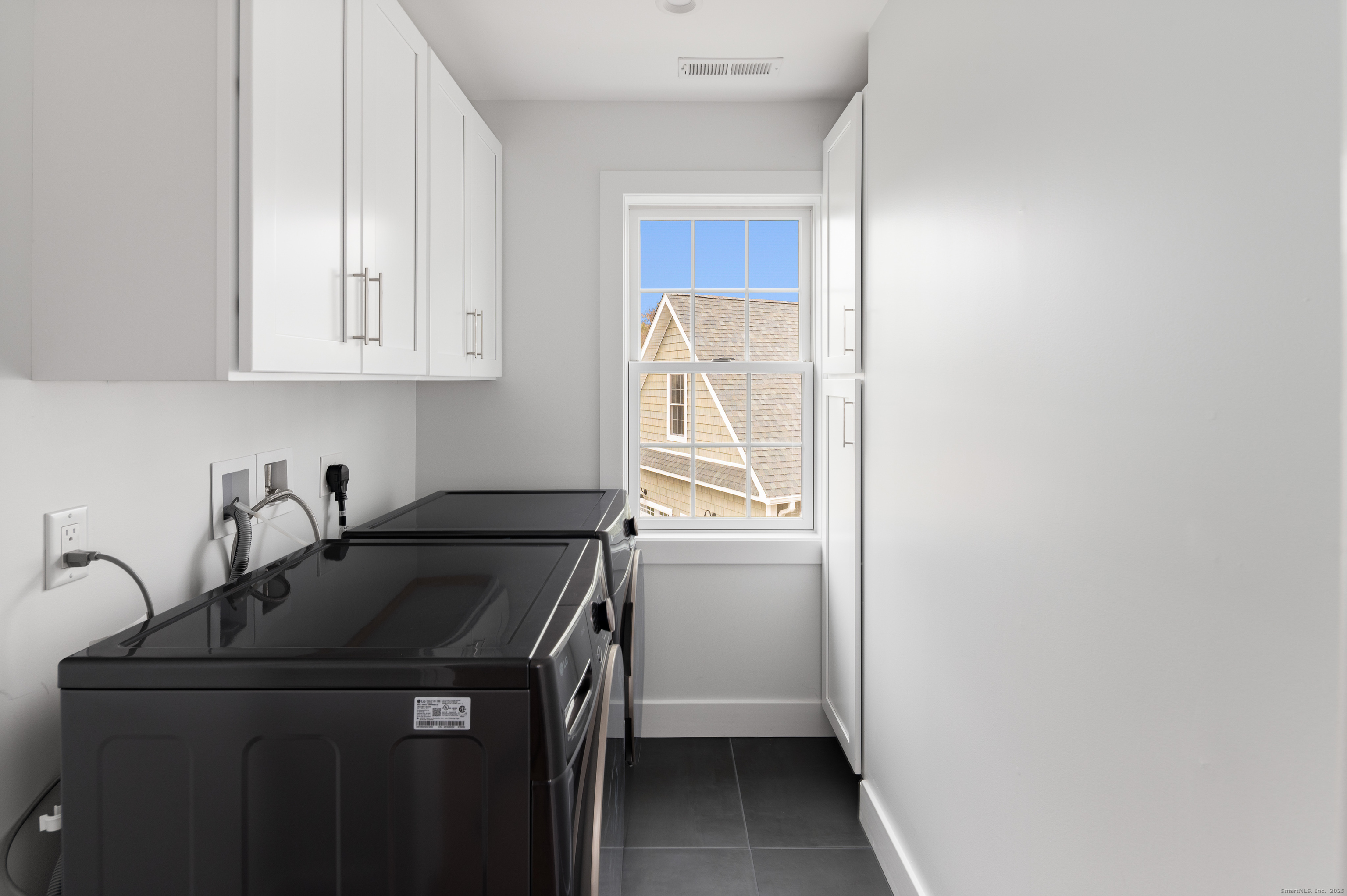 12 Walnut Ridge Court Stamford, CT 06905 - Photo 17 of 32 a utility room with dryer and washer