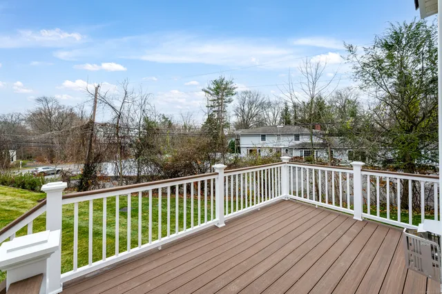 a view of a wooden roof deck