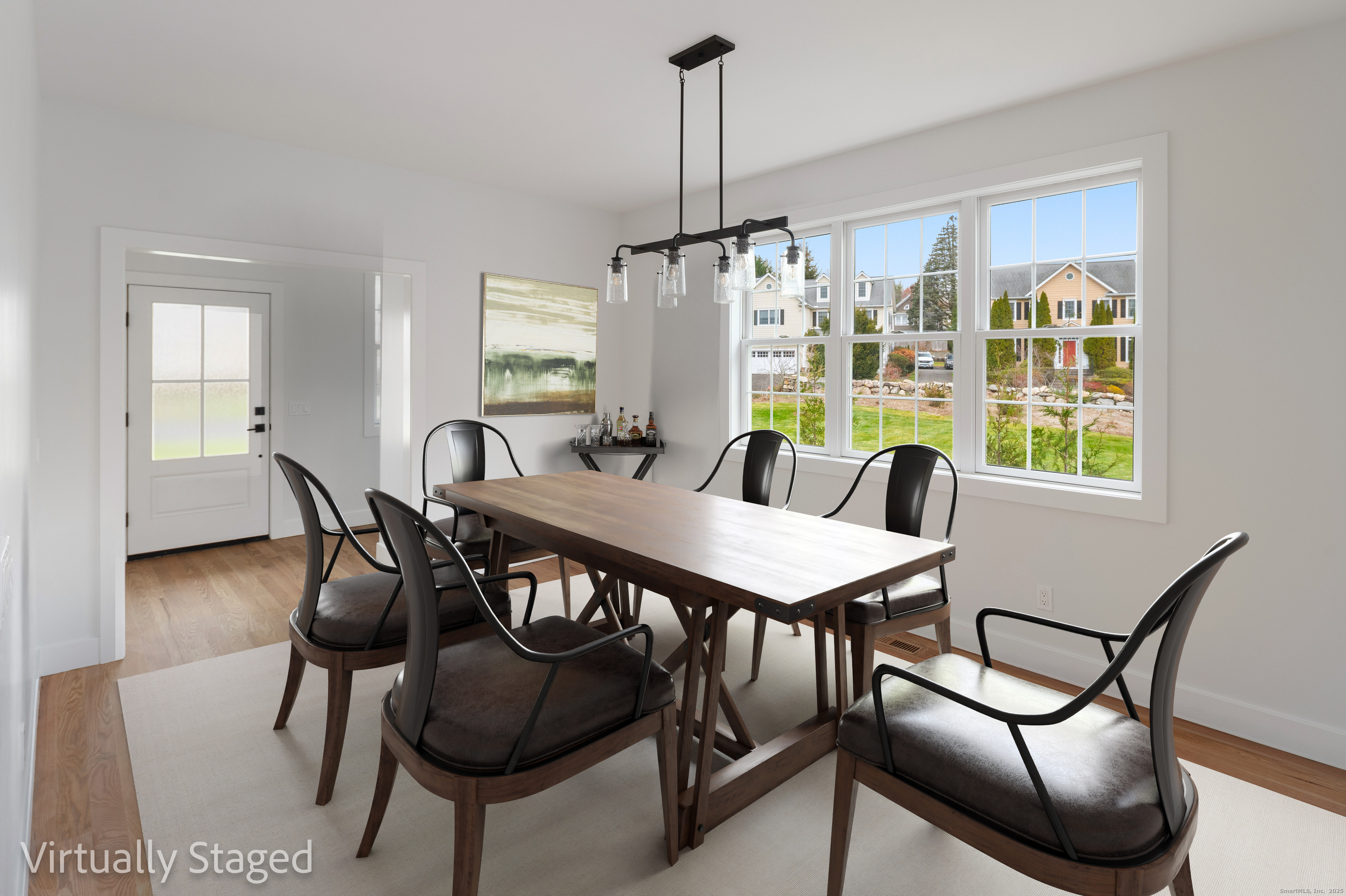 12 Walnut Ridge Court Stamford, CT 06905 - Photo 5 of 32 a view of a dining room with furniture window and wooden floor