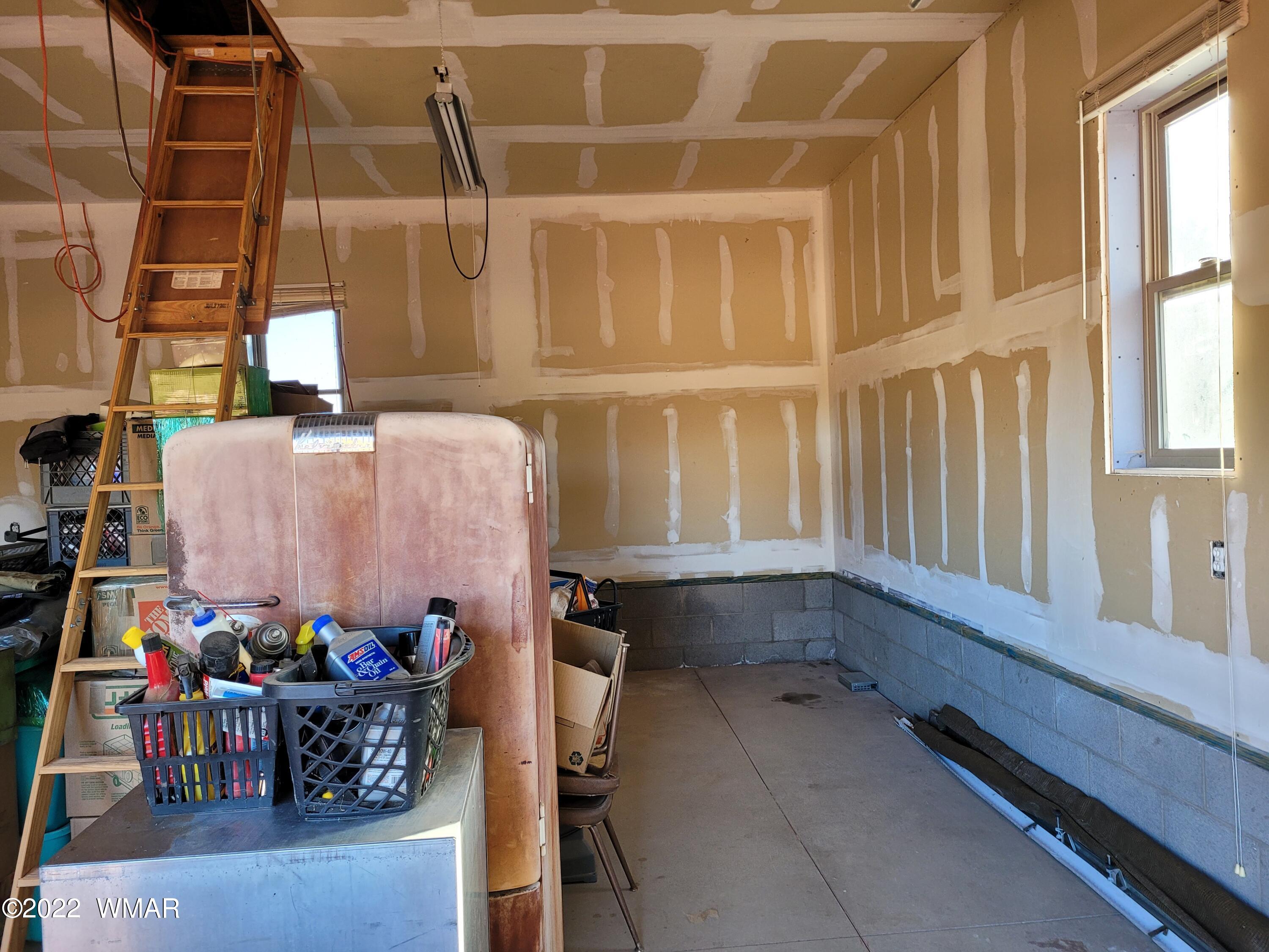 8 County Road 8309 Concho, AZ 85924 - Photo 32 of 45 a view of storage and utility room