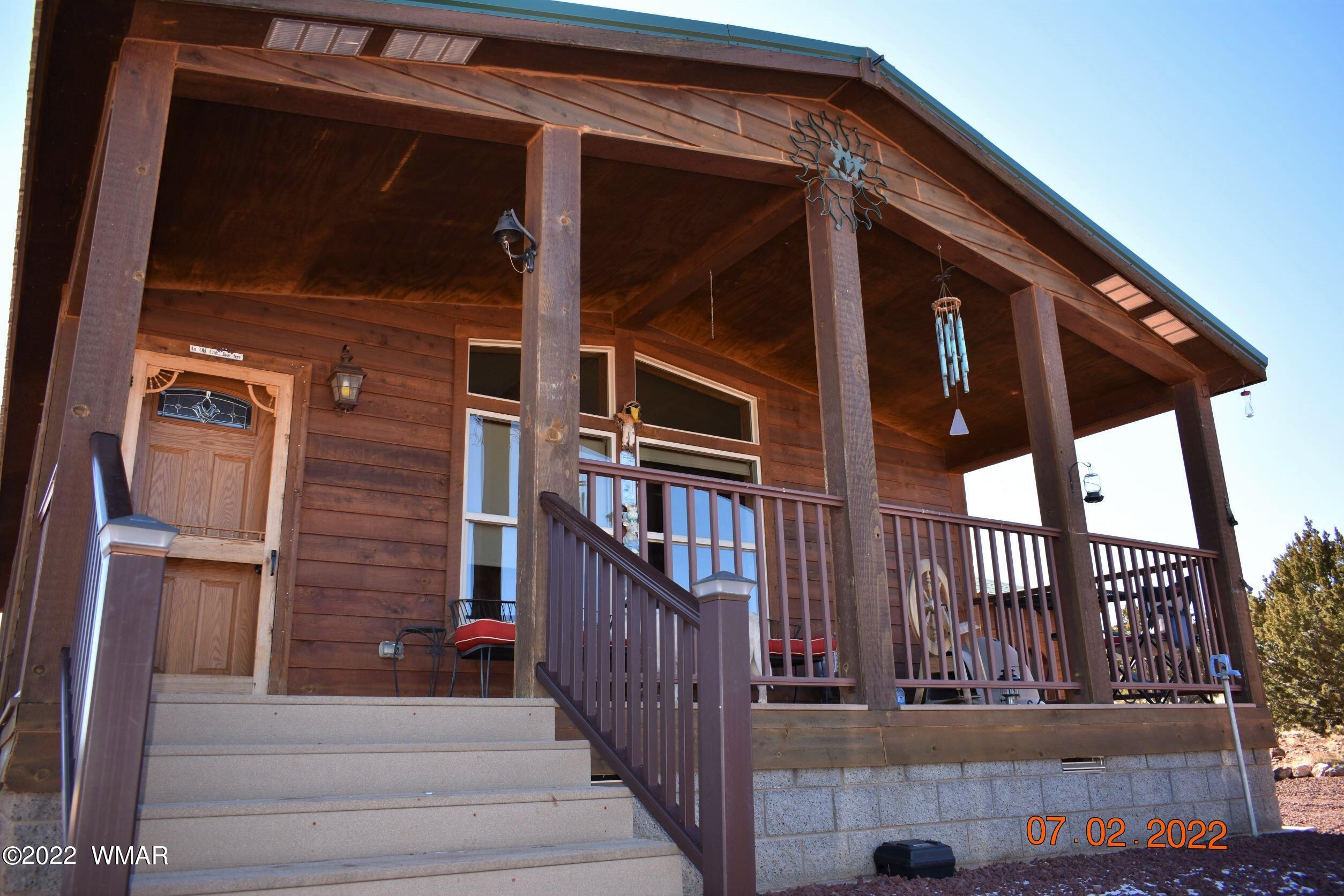 8 County Road 8309 Concho, AZ 85924 - Photo 4 of 45 a view of wooden house with a window