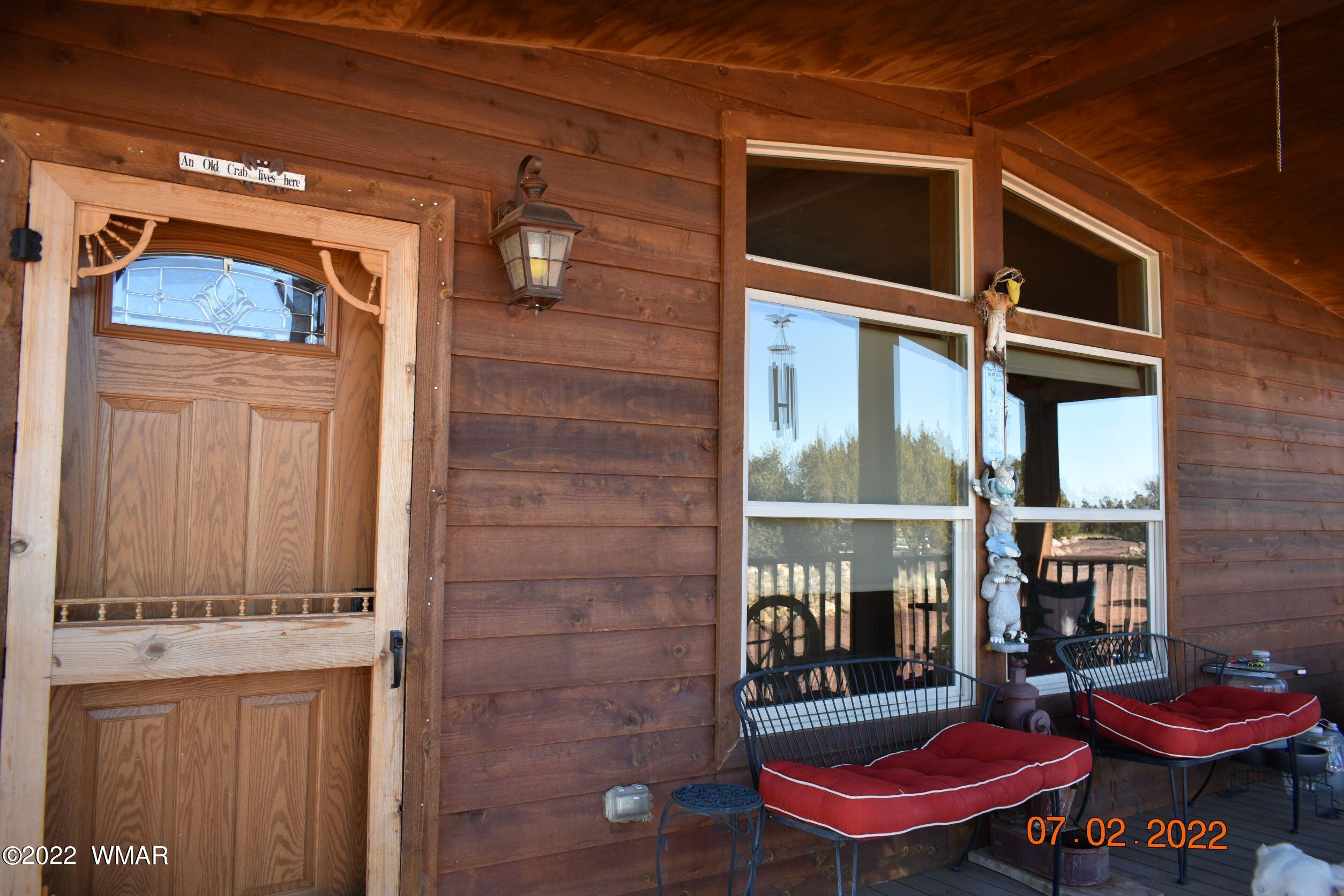 8 County Road 8309 Concho, AZ 85924 - Photo 9 of 45 a front view of a house with a yard
