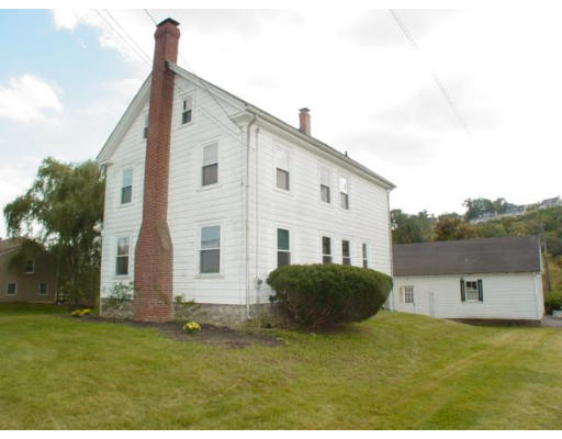 38 South Hampton Road Amesbury, MA 01913 - Photo 3 of 23 a view of a house with backyard and trees
