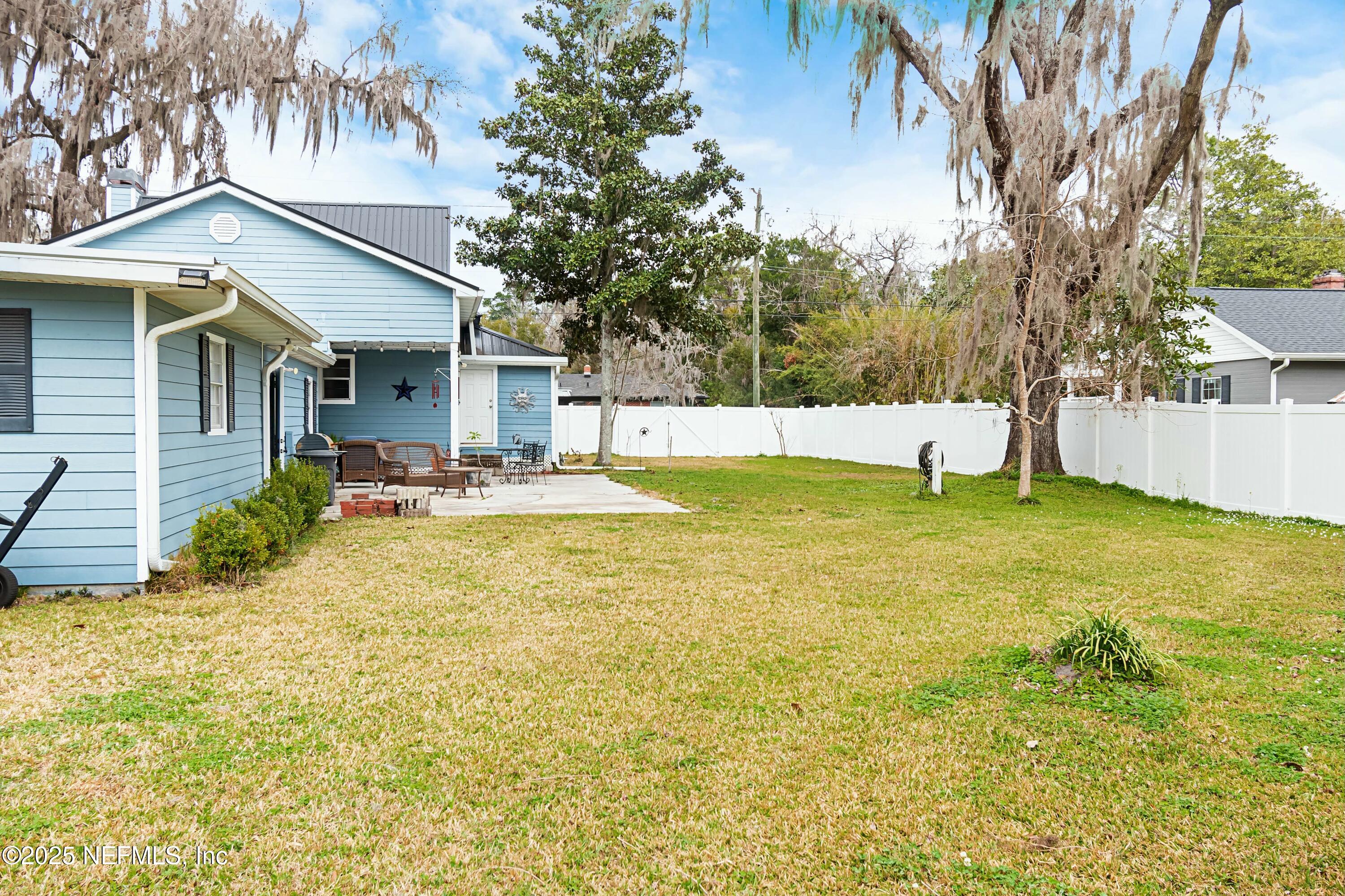 680 West Madison Street Starke, FL 32091 - Photo 13 of 22 a view of a house with swimming pool and sitting area