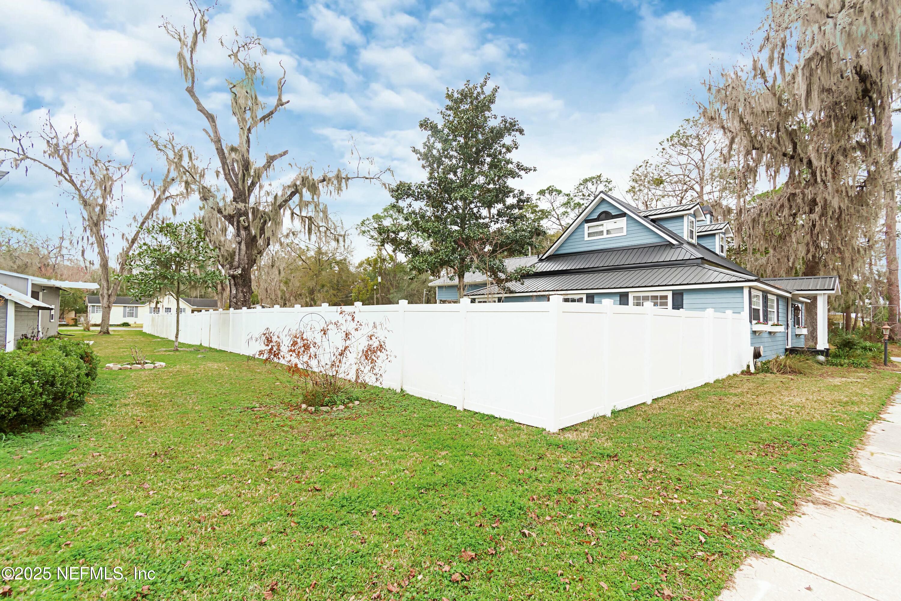 680 West Madison Street Starke, FL 32091 - Photo 15 of 22 a view of a house with a yard