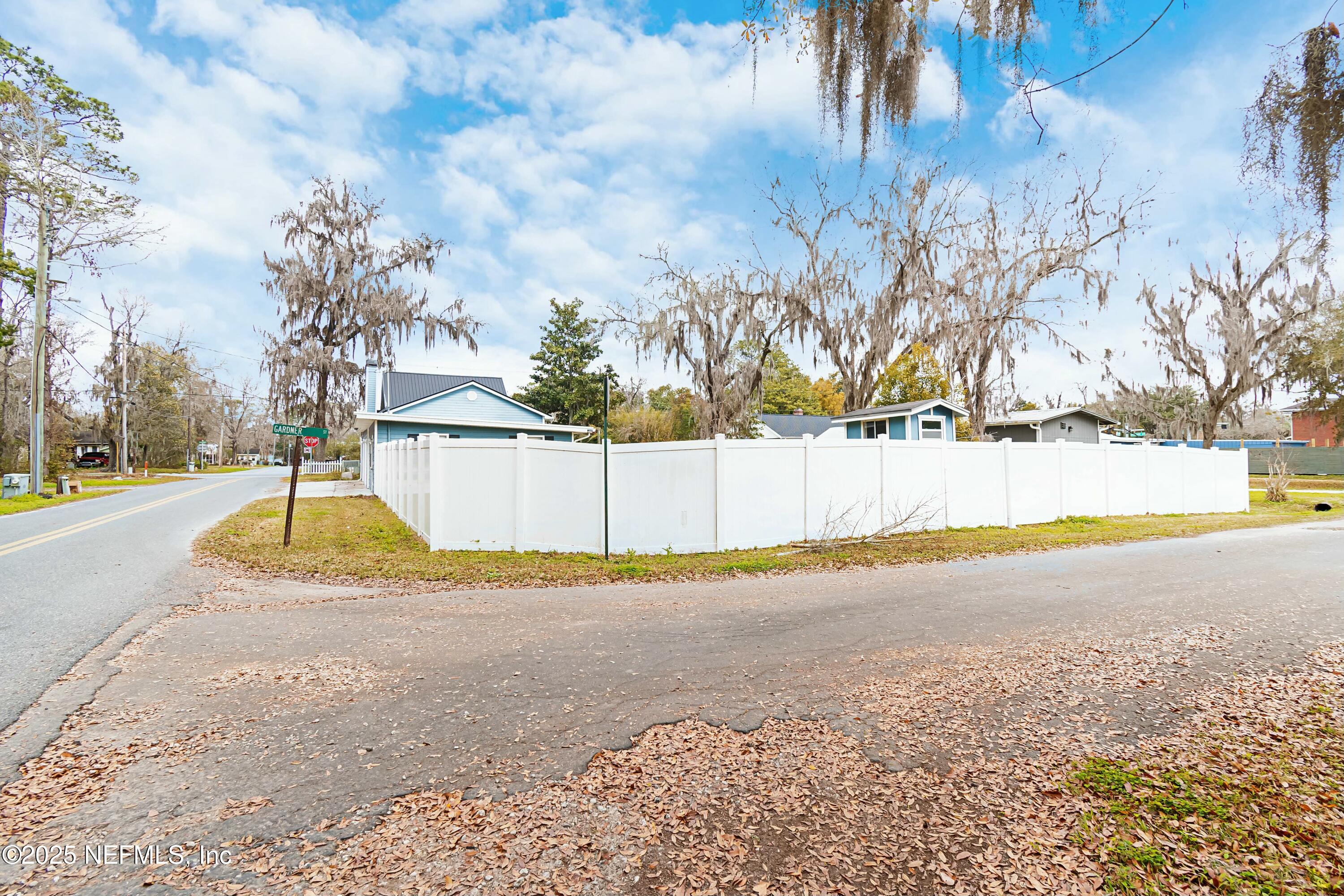 680 West Madison Street Starke, FL 32091 - Photo 17 of 22 a view of a swimming pool with a yard