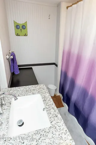 a bedroom with a bed and a closet