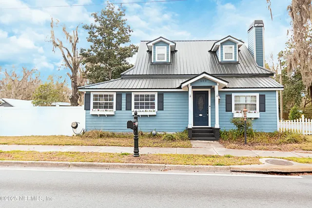 a front view of a house with a porch