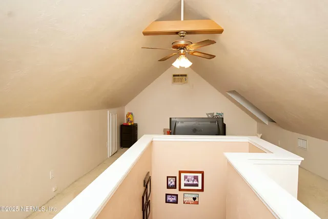 a view of a chairs and table in a patio