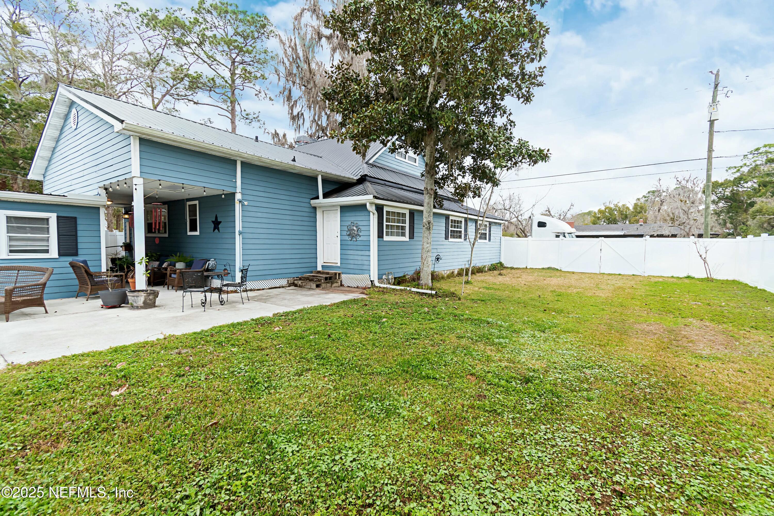 680 West Madison Street Starke, FL 32091 - Photo 5 of 22 a house view with swimming pool and garden space