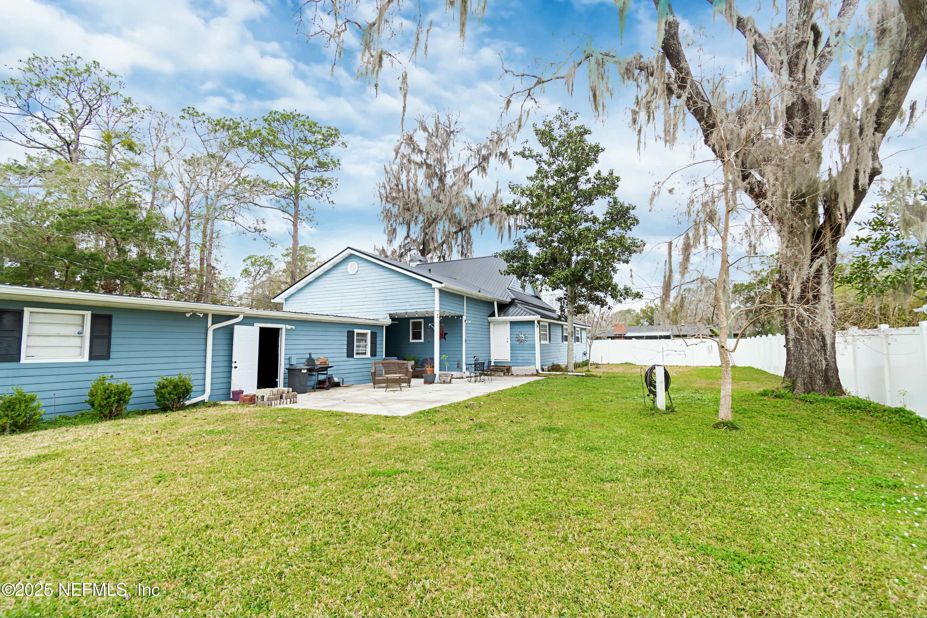 680 West Madison Street Starke, FL 32091 - Photo 9 of 22 a house that has a tree in front of it