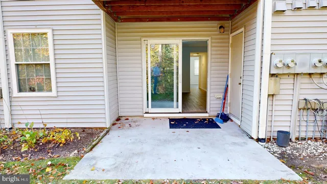 a view of a potted plant in front of a house