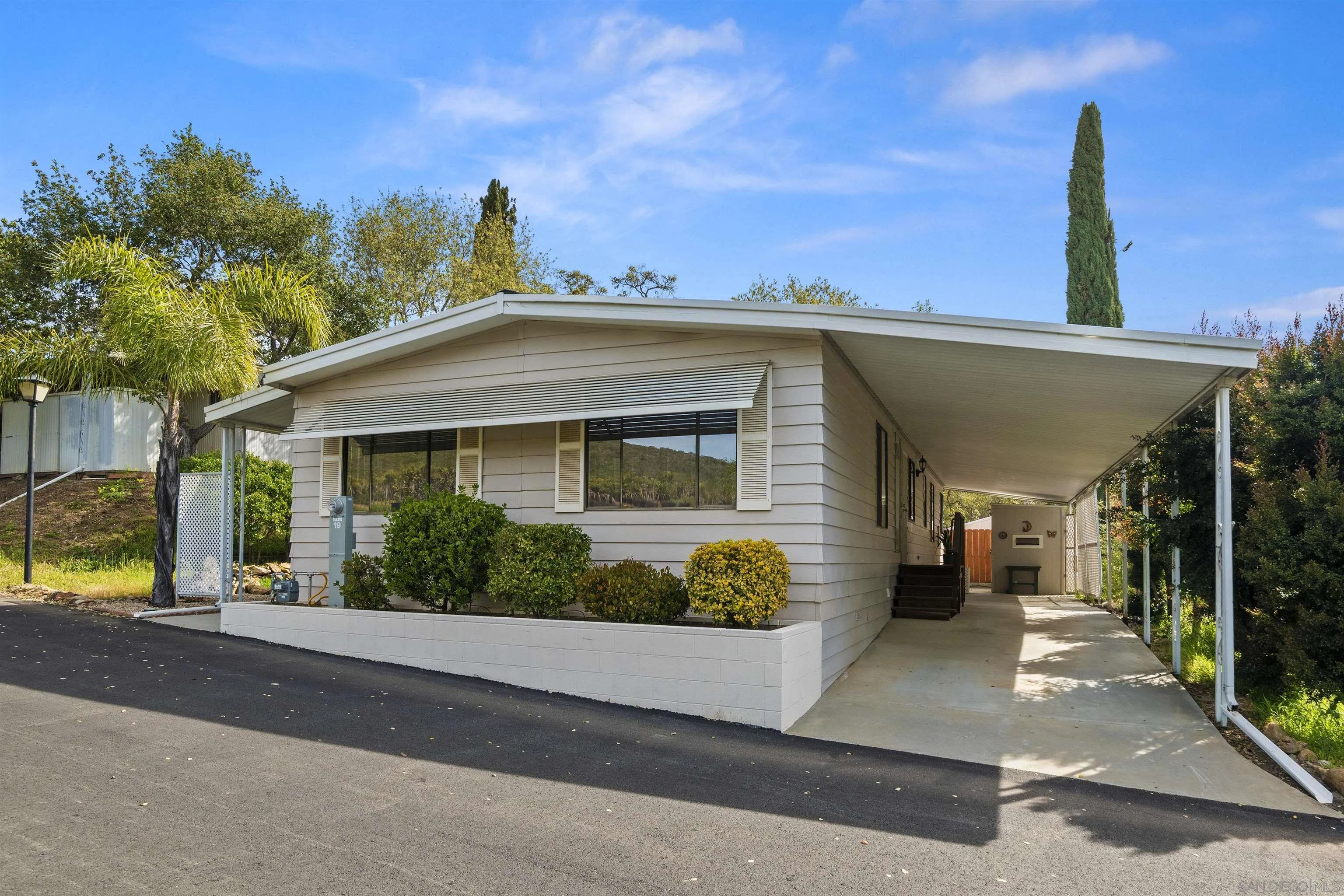 4747 Oak Crest Road, Unit 19 Fallbrook, CA 92028 - Photo 1 of 53 a view of a house with a outdoor space