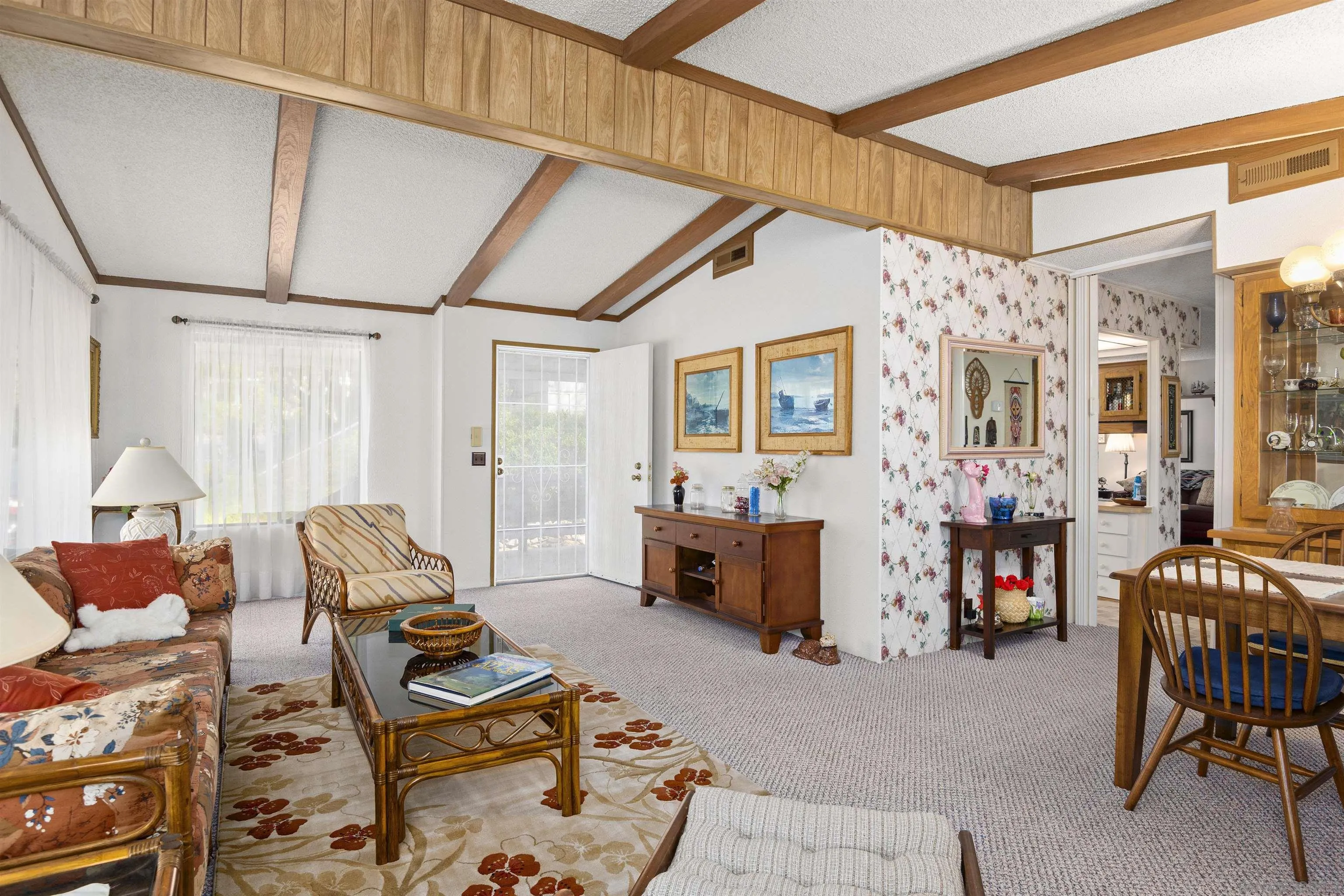 4747 Oak Crest Road, Unit 19 Fallbrook, CA 92028 - Photo 14 of 53 a living room with furniture a rug and a table