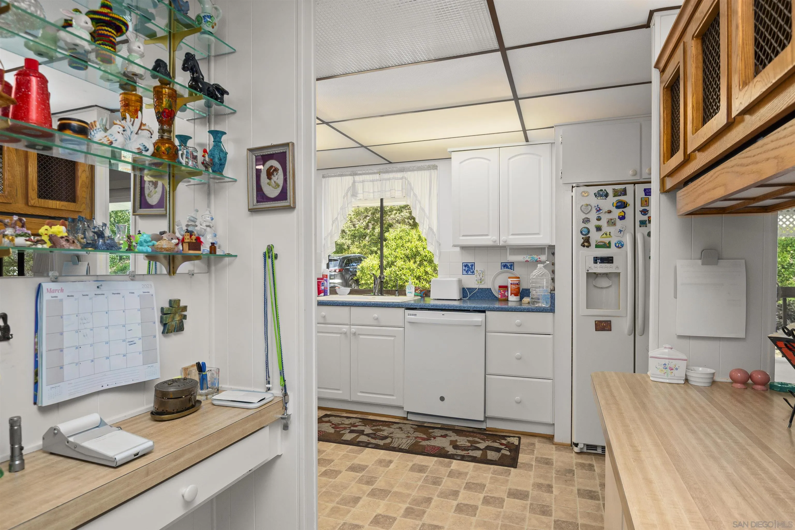 4747 Oak Crest Road, Unit 19 Fallbrook, CA 92028 - Photo 16 of 53 a kitchen with sink and refrigerator