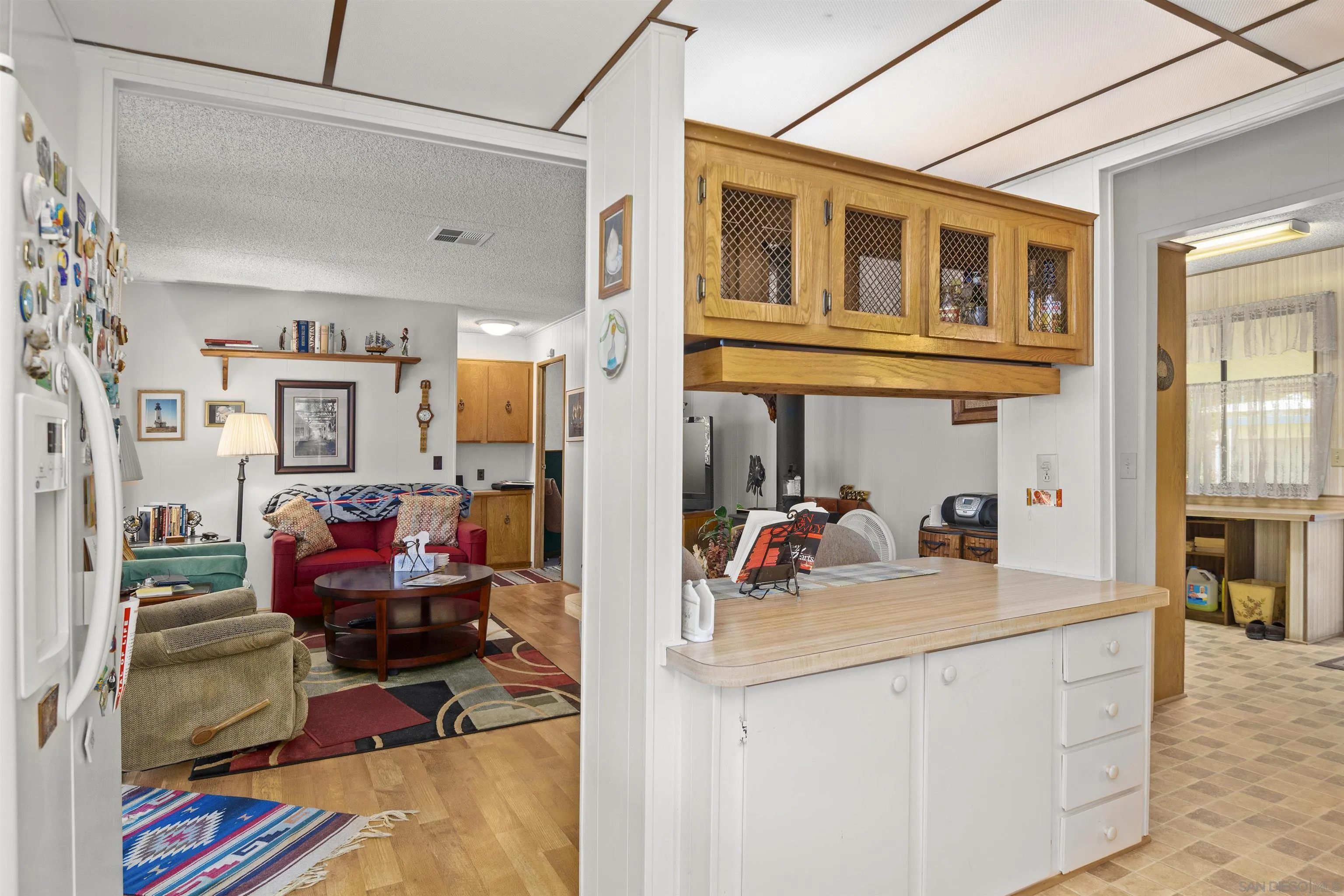 4747 Oak Crest Road, Unit 19 Fallbrook, CA 92028 - Photo 18 of 53 a view of living room and kitchen