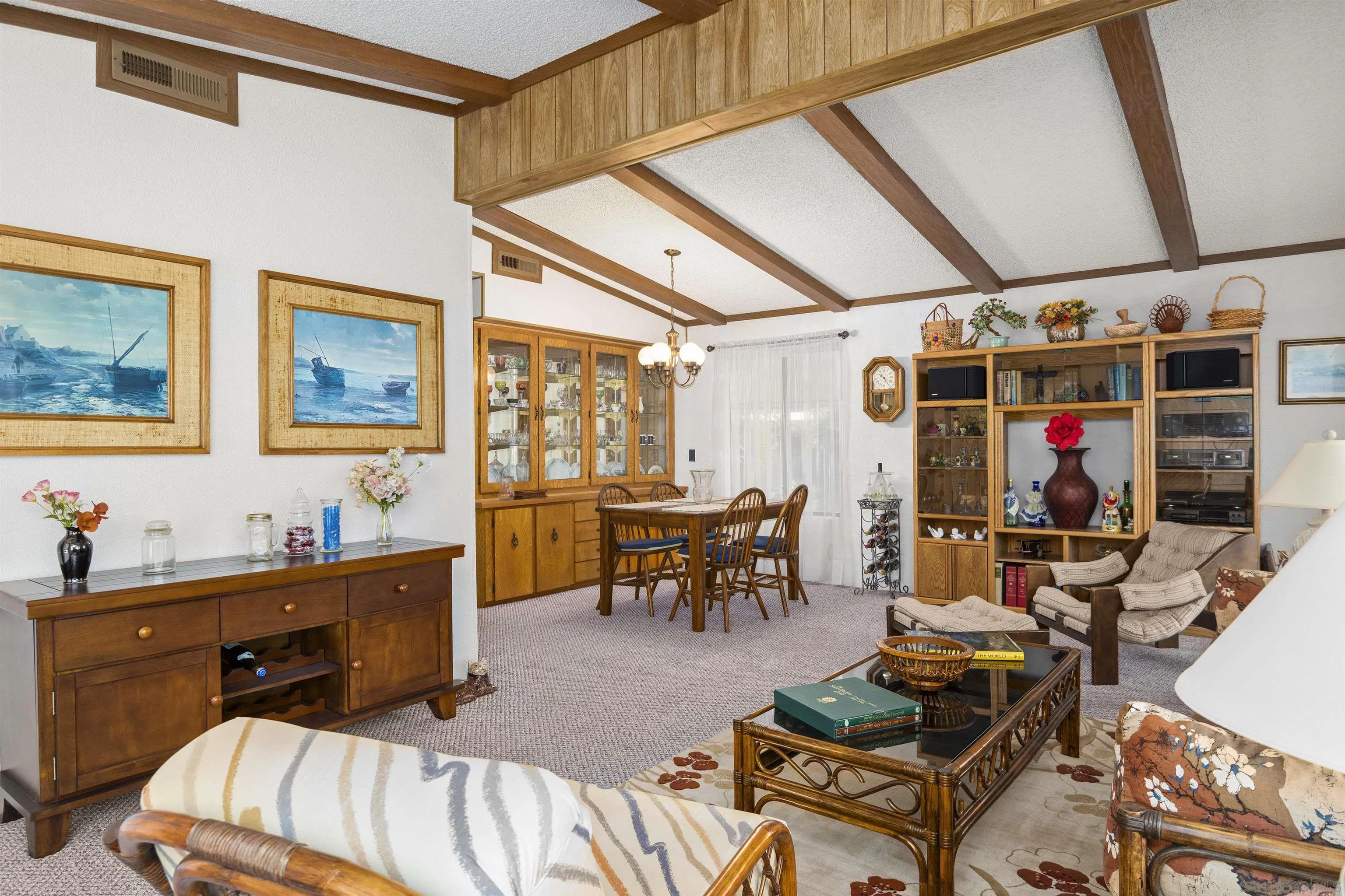 4747 Oak Crest Road, Unit 19 Fallbrook, CA 92028 - Photo 2 of 53 a living room with furniture a dining table and chairs with wooden floor