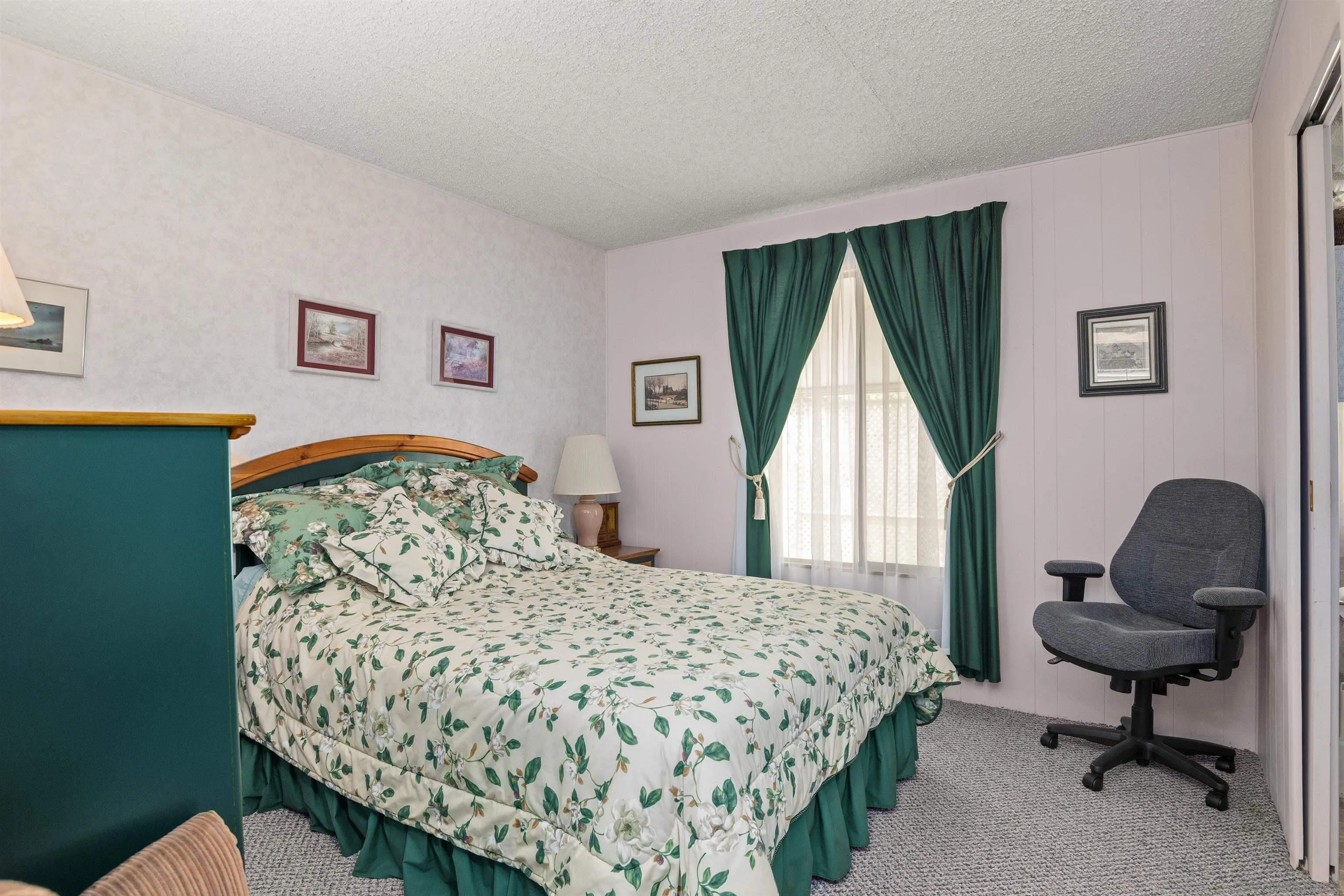 4747 Oak Crest Road, Unit 19 Fallbrook, CA 92028 - Photo 22 of 53 a bedroom with a bed chair and a window
