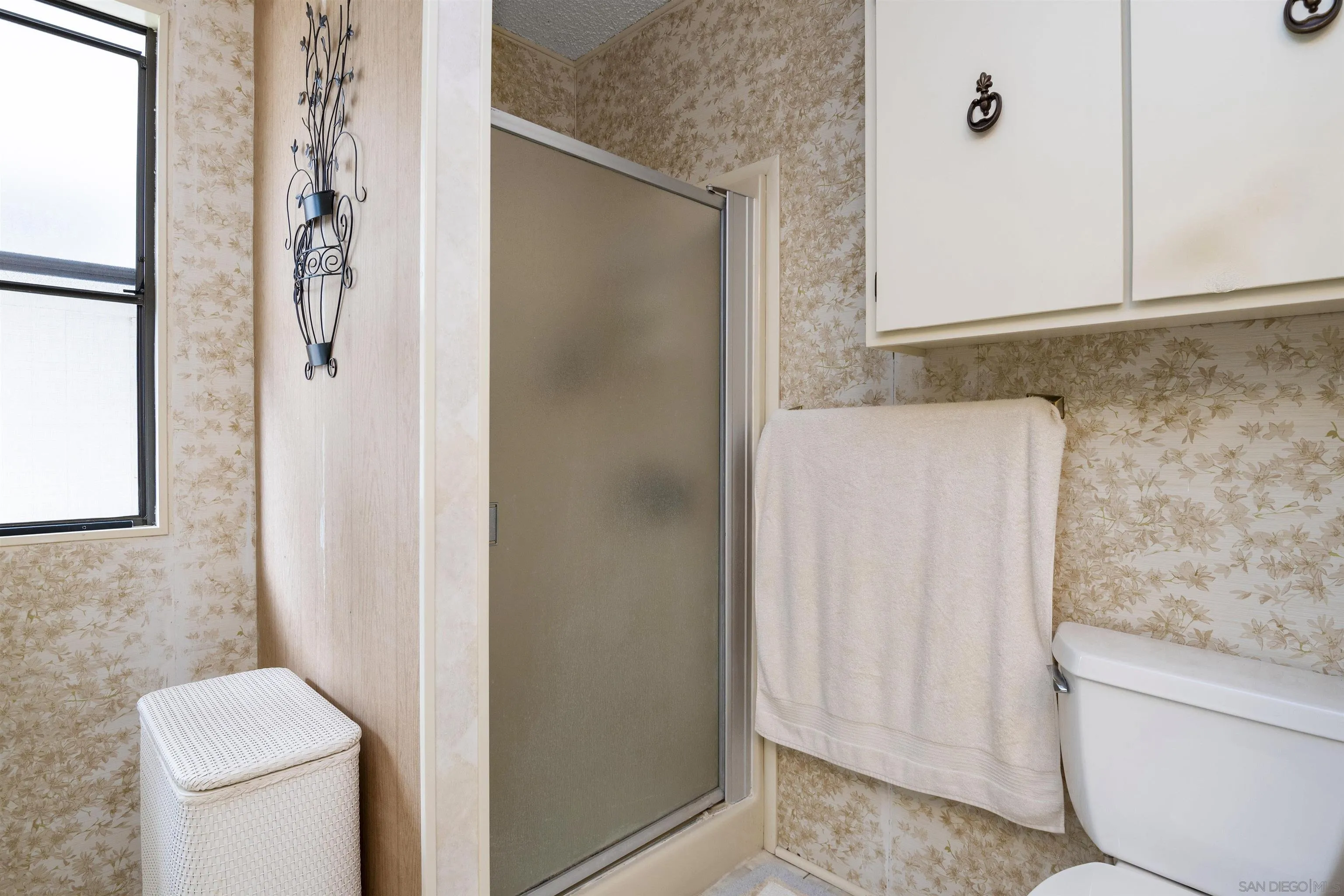 4747 Oak Crest Road, Unit 19 Fallbrook, CA 92028 - Photo 30 of 53 a bathroom with a shower and a toilet