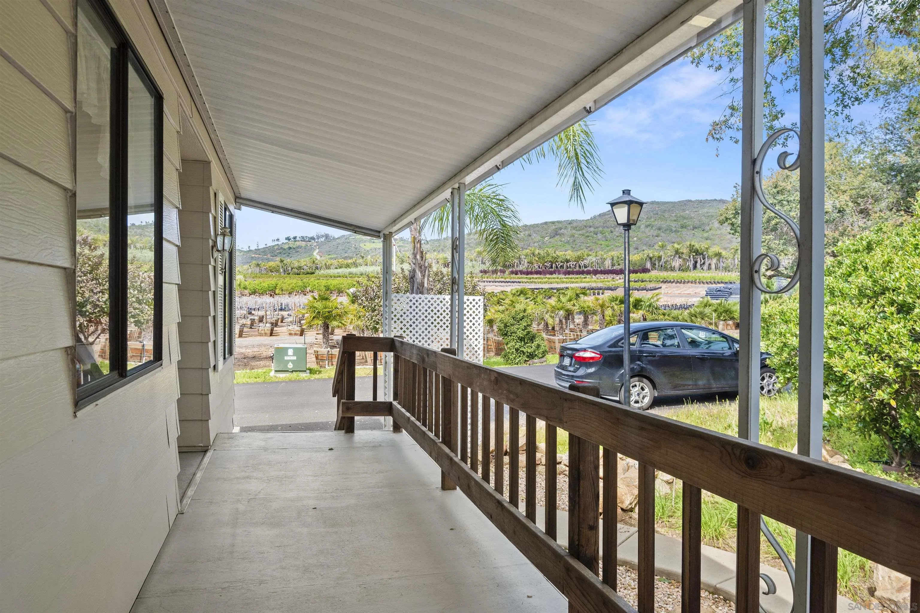 4747 Oak Crest Road, Unit 19 Fallbrook, CA 92028 - Photo 32 of 53 a view of a city from a balcony