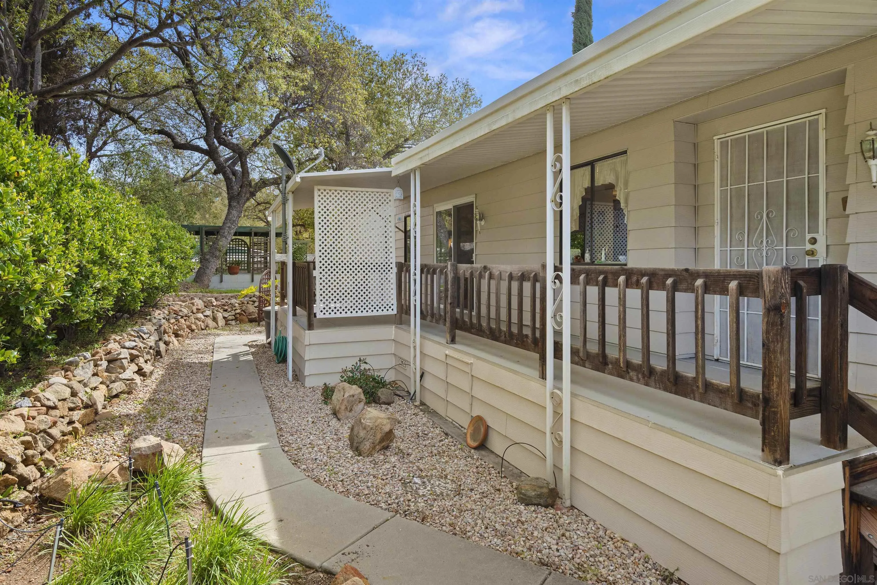 4747 Oak Crest Road, Unit 19 Fallbrook, CA 92028 - Photo 6 of 53 front view of a house with a porch