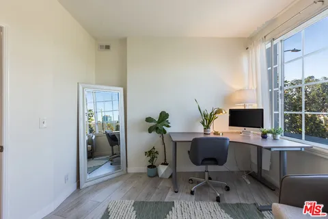 a bathroom with a toilet a sink and bathtub