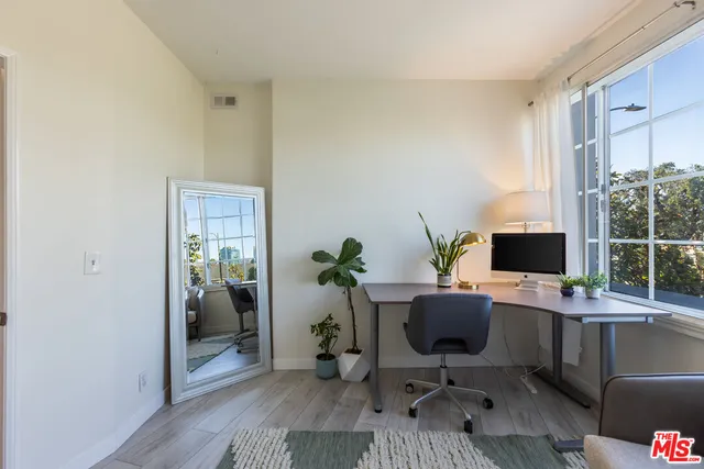 a bathroom with a toilet a sink and bathtub