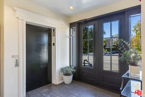 a view of hallway with elevator