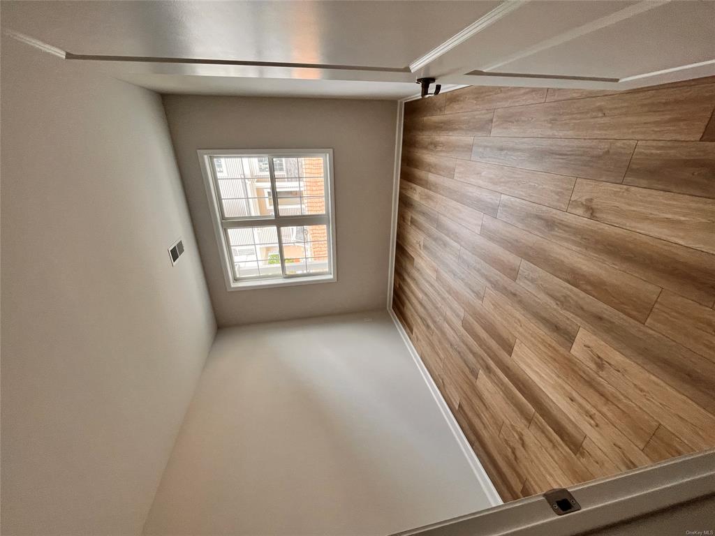 227 Tower Ridge Circle, Unit 227 Middletown, NY 10941 - Photo 10 of 16 Empty room with light hardwood / wood-style floors