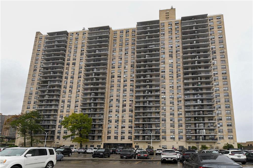 a front view of a building with a street