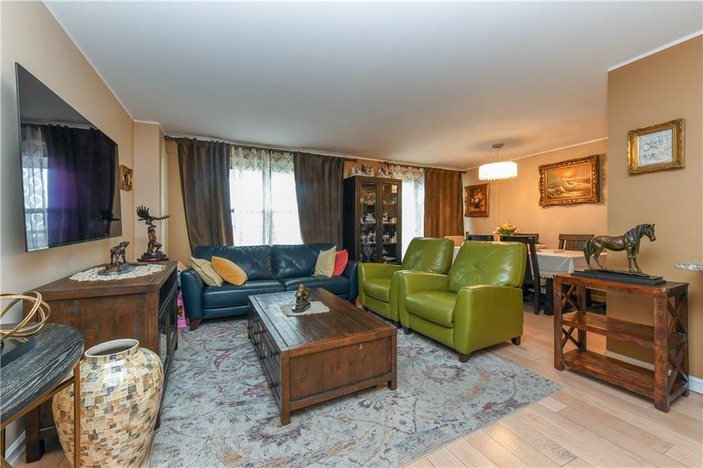 601 Surf Avenue, Unit 20J Brooklyn, NY 11224 - Photo 12 of 46 a living room with furniture and a window