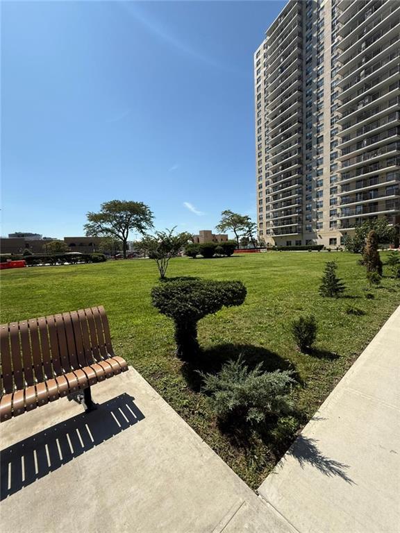 601 Surf Avenue, Unit 20J Brooklyn, NY 11224 - Photo 30 of 46 a view of a garden with wooden fence