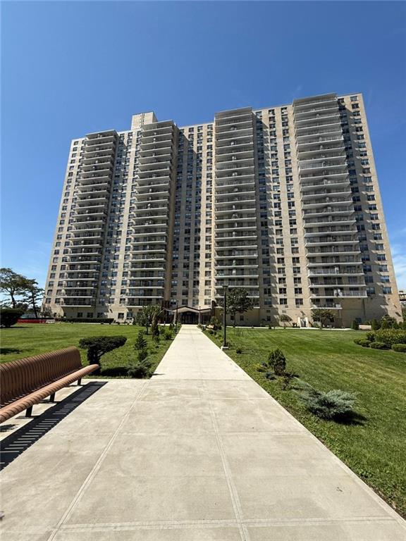 601 Surf Avenue, Unit 20J Brooklyn, NY 11224 - Photo 31 of 46 a front view of a building with garden