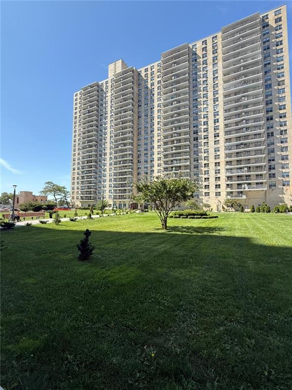 601 Surf Avenue, Unit 20J Brooklyn, NY 11224 - Photo 32 of 46 a view of a building with a yard